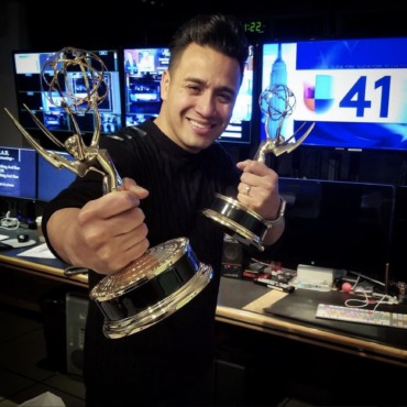 Fernando Garcia is celebrating with his NY Emmy Awards for Television Direction, Producing, and Graphic Design at Univision Noticias 41.